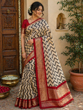 Elegant Fancy Saree for Women – Cream & Black Zigzag Print with Red Zari Border
