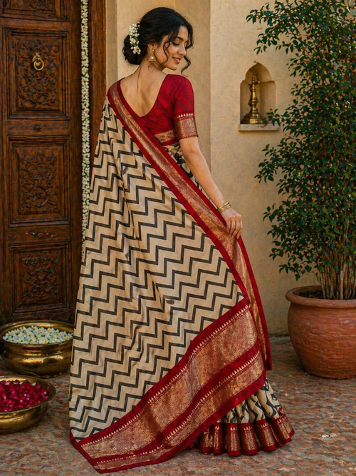 Elegant Fancy Saree for Women – Cream & Black Zigzag Print with Red Zari Border